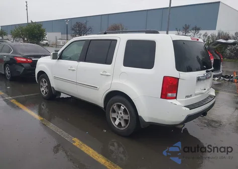 2010 Honda Pilot Touring z USA, uszkodzony, nr VIN 5FNYF3H94AB015822